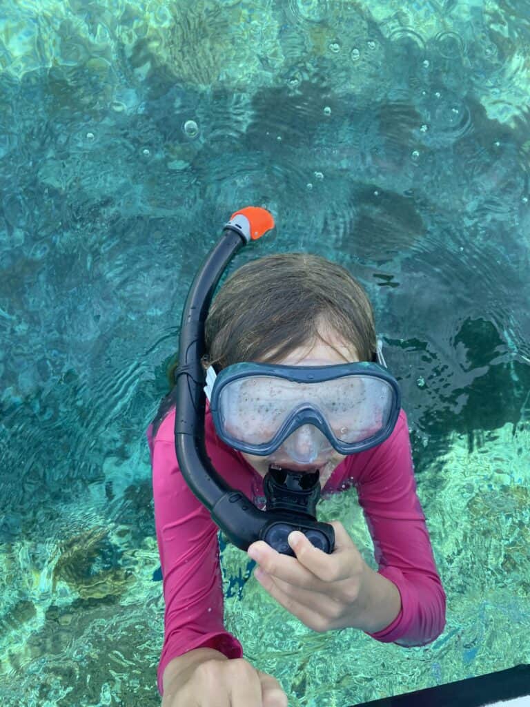 snorkling child in the sea in the Gili Islands